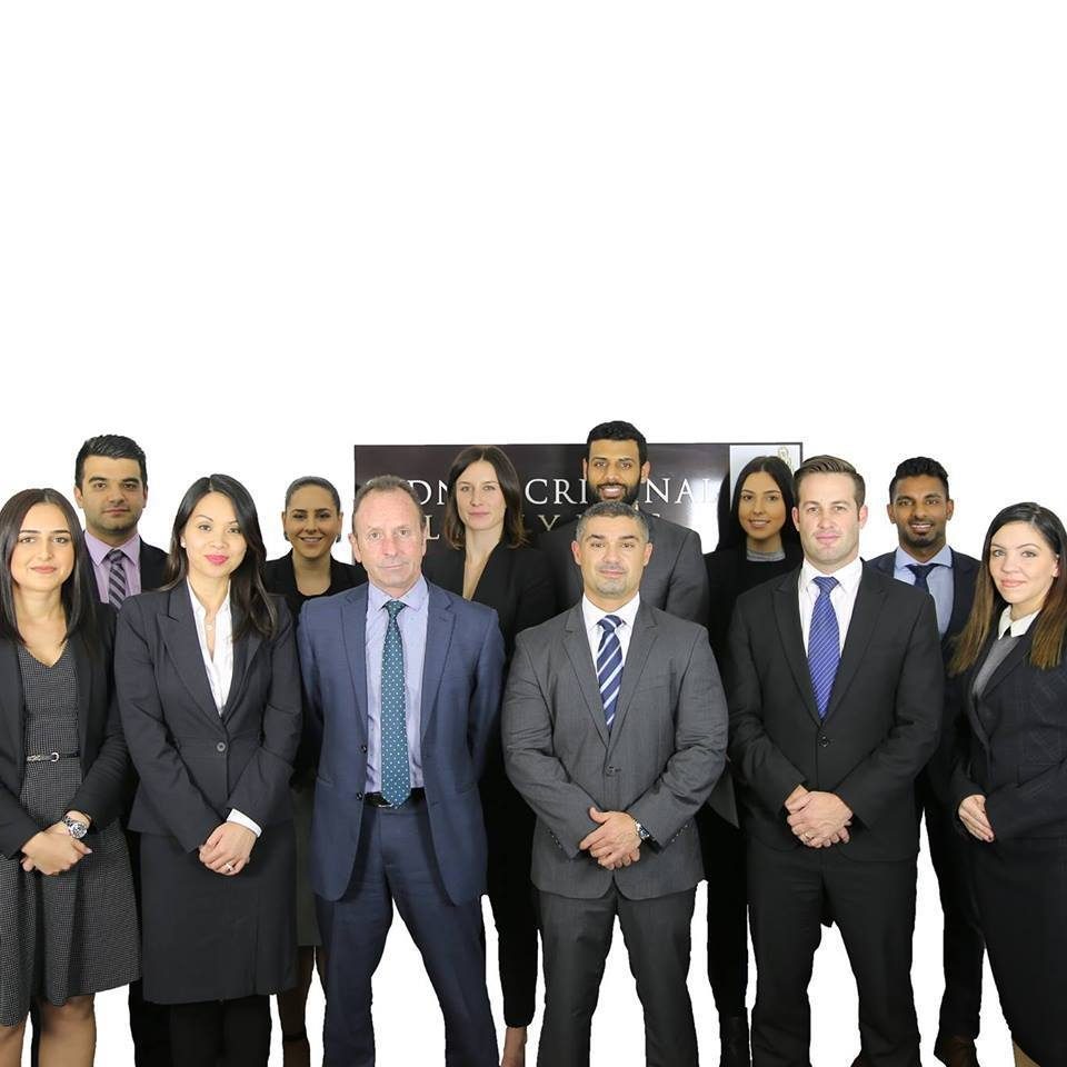 Criminal defence solicitor consulting with a client